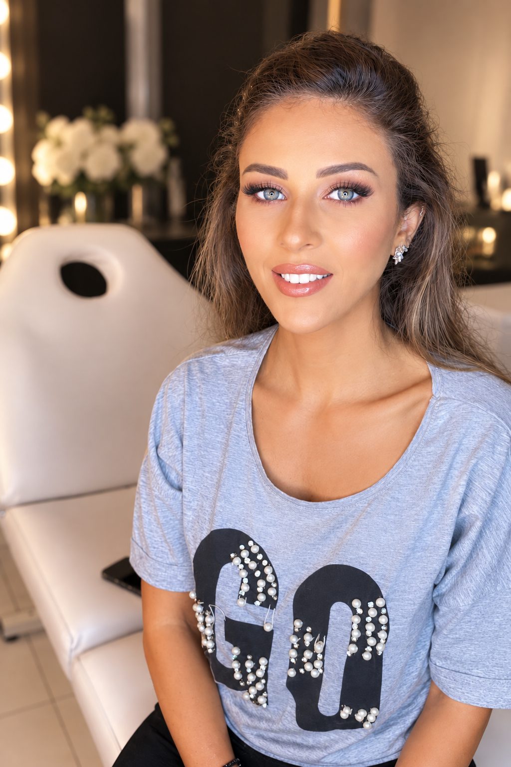 Soft glam with pink-toned eyes and glossy lip